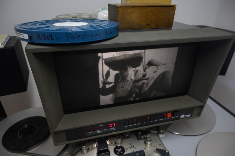 a frame from a film showing scenes of daily life in palestine, part of a collection of 40 palestinian films made between 1960 and 1980, is displayed at the conservation and research center of the toulouse cinematheque, in toulouse, southwestern france, on august 1, 2024.