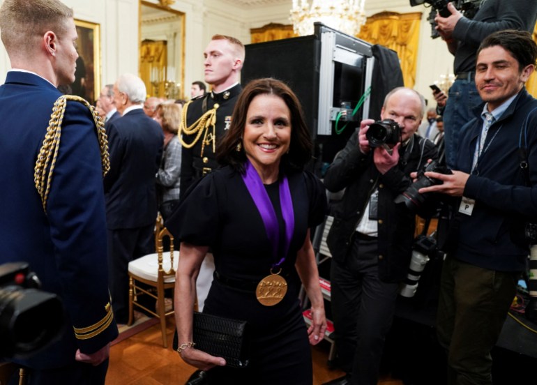 National Medal of Arts recipient actress Julia Louis-Dreyfus attends the presentation of the 2021 National Medals of Arts in conjunction with the 2021 National Humanities Medals during a ceremony in the East Room at the White House in Washington, U.S., March 21, 2023. REUTERS/Kevin Lamarque