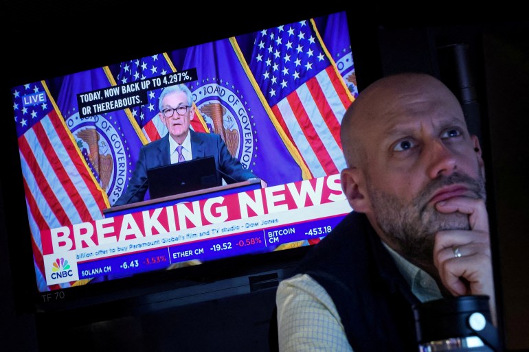 file photo: a trader works, as a screen broadcasts a news conference by u.s. federal reserve chair jerome powell following the fed rate announcement, on the floor of the new york stock exchange (nyse) in new york city, u.s., march 20, 2024. reuters/brendan mcdermid/file photo