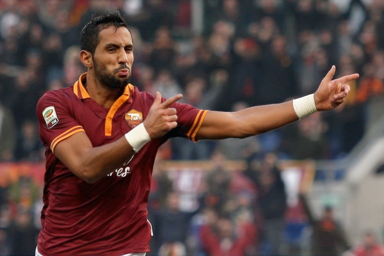 rome, italy - december 22: mehdi benatia of as roma celebrates after scoring the third team's goal during the serie a match between as roma and calcio catania at stadio olimpico on december 22, 2013 in rome, italy. (photo by paolo bruno/getty images)