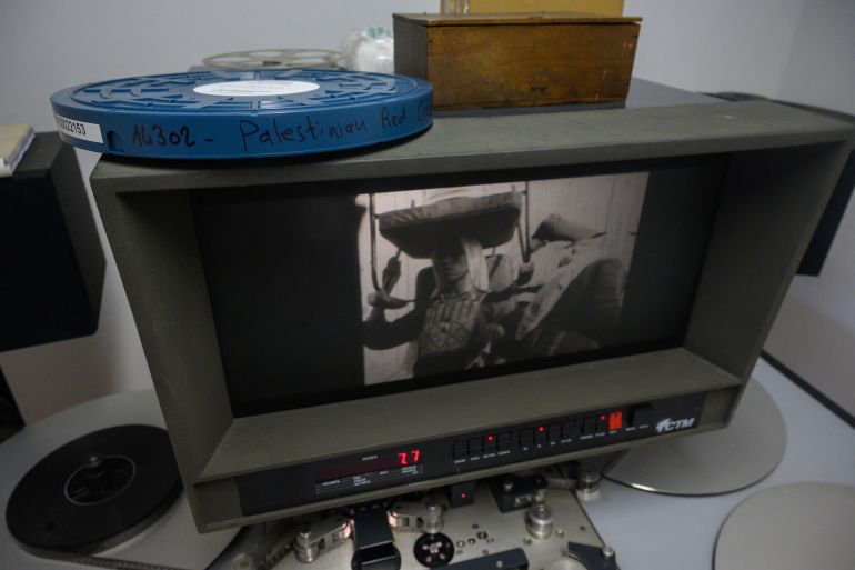 a frame from a film showing scenes of daily life in palestine, part of a collection of 40 palestinian films made between 1960 and 1980, is displayed at the conservation and research center of the toulouse cinematheque, in toulouse, southwestern france, on august 1, 2024. - in the early 1980s, the palestinian film institute in beirut, where around a hundred militant films were stored, was bombed by israel during the lebanon war. its director, khadijeh habashneh, fled the country, leaving the reels behind. almost 40 years later, the 79-year-old former director of the institute has managed to collect 40 short and medium-length films, in 16 and 30 mm formats, which will be shown to the general public at the cine palestine festival in toulouse. (photo by ed jones / afp)