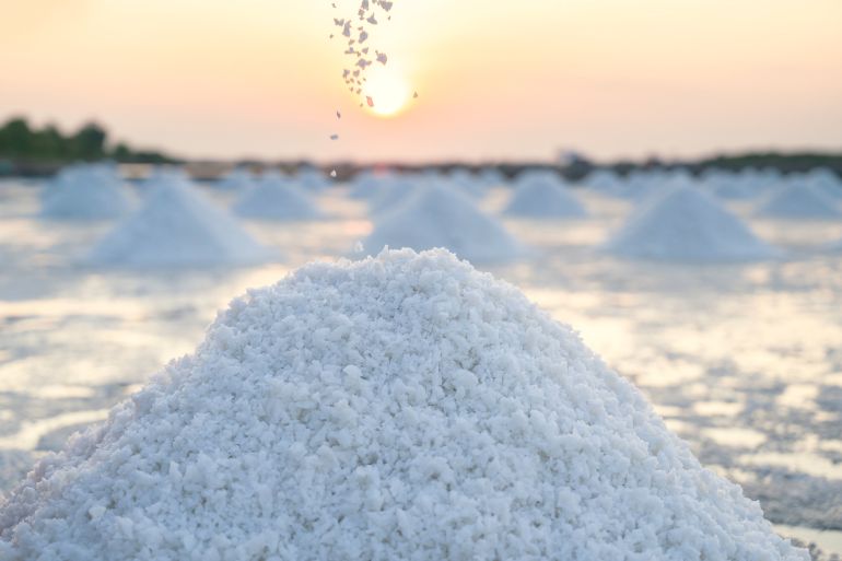 morning sunrise salt in a salt farm in thailand