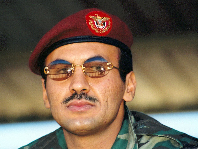 epa03514523 (file) a file photo dated 06 march 2004 shows lieutenant colonel ahmad ali abdullah saleh, the eldest son of yemeni president ali abdullah saleh, watching maneuvers by special forces at a camp near the yemen's capital sana'a. media reports on 19 december 2012 state that yemeni president abd rabu mansour hadi moved to assert his control over the country's army, abolishing the forces headed by rival army chiefs. decrees issued late on 19 december by hadi abolished the republican guard commanded by ahmad ali saleh, the son of hadi's predecessor ali abdullah saleh, according to local newspapers al-masdar and mareb press reporting online. epa/km - أحمد علي عبدالله صالح