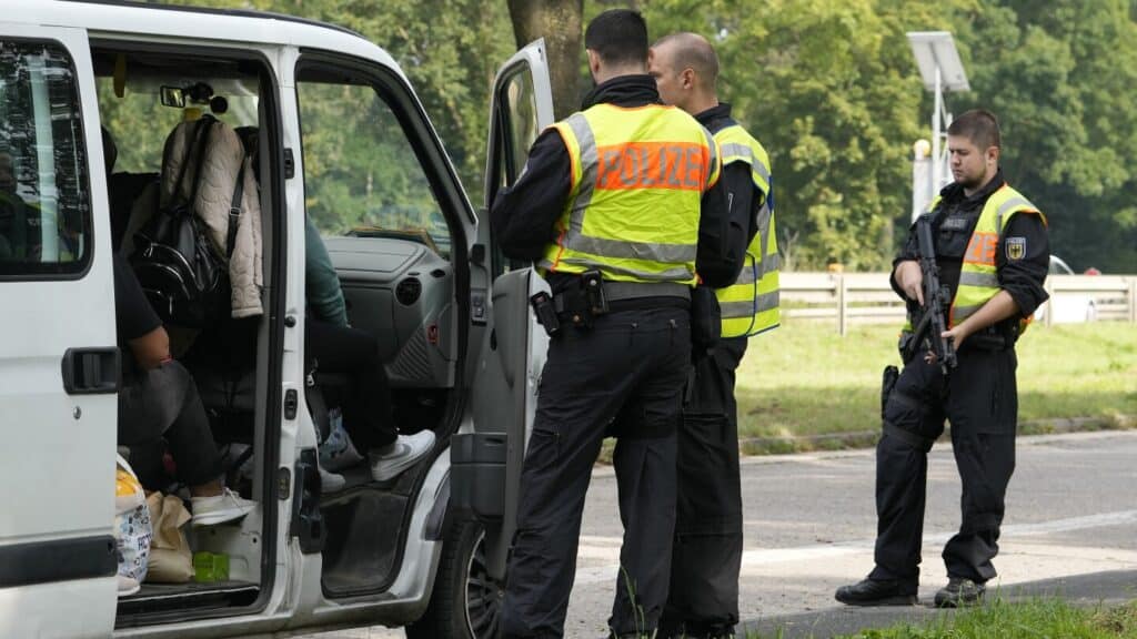 Germany begins conducting checks at all its land borders