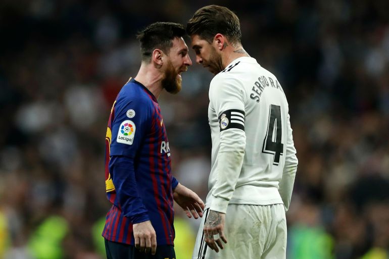 file - in this march 2, 2019 file photo, barcelona forward lionel messi, left, goes head to head with real defender sergio ramos as they argue during the spanish la liga soccer match between real madrid and fc barcelona at the bernabeu stadium in madrid. the spanish football league on wednesday oct. 16. 2019, has asked the spanish football federation to change the location of the match between barcelona and real madrid to avoid it coinciding with plans for a separatist rally. the league wants the federation to shift the match to madrid. (ap photo/manu fernandez, file)