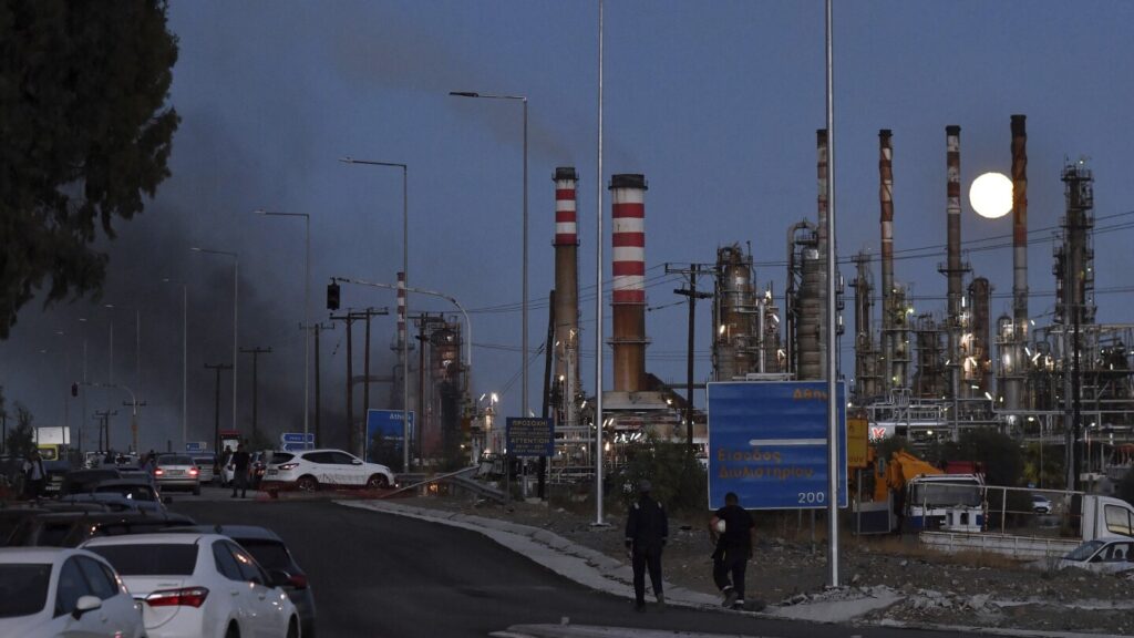 Greek firefighters contain a blaze at a major oil refinery that injured 3 workers