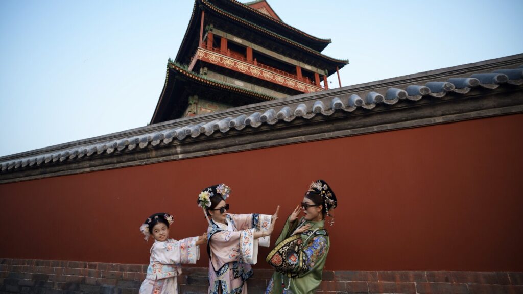 Beijing’s imperial palace bustles with throngs of visitors in Qing dynasty costumes