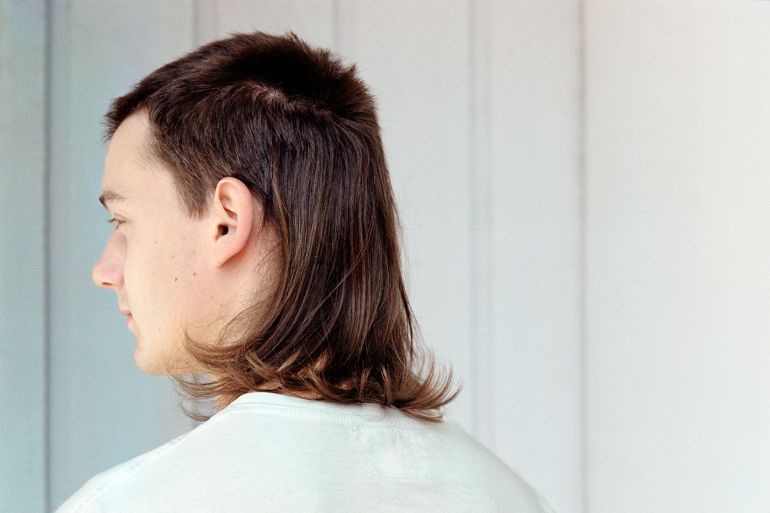 Young Man with Mullet - stock photo