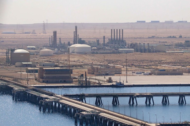 a picture taken on september 24, 2020 shows the brega oil port in marsa brega, some 270kms west of libya's eastern city of benghazi. libya’s state oil firm lifted force majeure on what it deemed secure oil ports and facilities on september 20, a day after strongman khalifa haftar said he was lifting a blockade on oilfields and ports. the blockade, which has resulted in more than $9.8 billion in lost revenue according to the state-run national oil corporation (noc), has exacerbated electricity and fuel shortages in the country. / afp / -