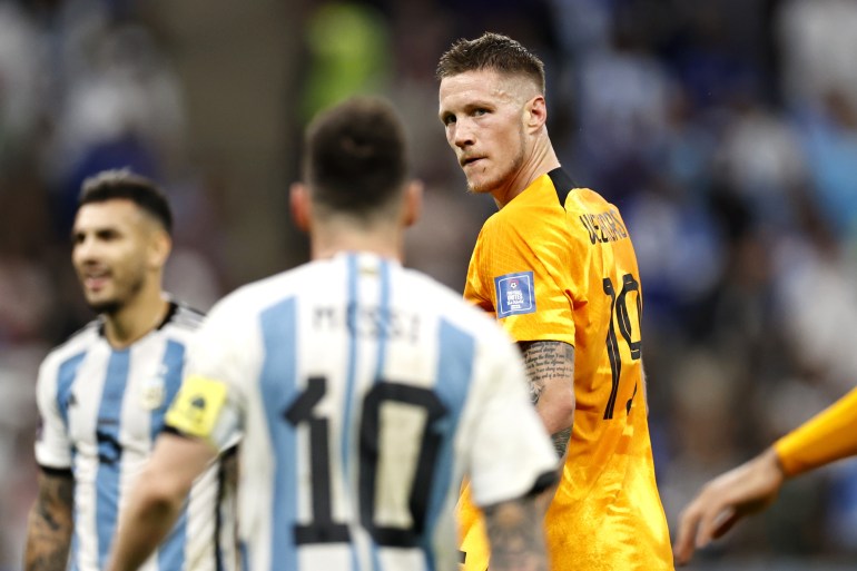 al daayen - (lr) lionel messi of argentina, wout weghorst of holland during the fifa world cup qatar 2022 quarterfinal match between the netherlands and argentina at the lusail stadium on december 9, 2022 in al daayen, qatar. anp maurice van stone (photo by anp via getty images)