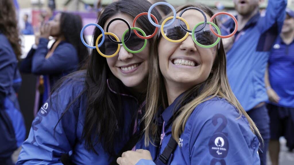 With a parade of athletes on Champs Elysées, France throws one last party for the Paris Olympics