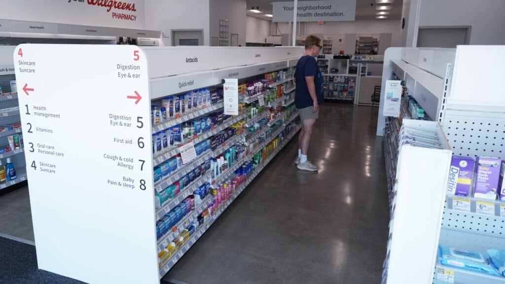 Drugstores tinker with new looks as their usual way of doing business faces challenges