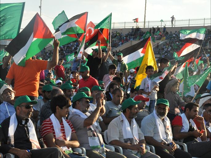 الفعاليات الشبابية والشعبية تلوح بأعلام فلسطين ودول الربيع العربي خلال مهرجان " الأقصى في خطر" التاسع عشر الذي أقيم بأم الفحم بالداخل الفلسطيني بـ 12 من شهر سبتمبر‎-أيلول.