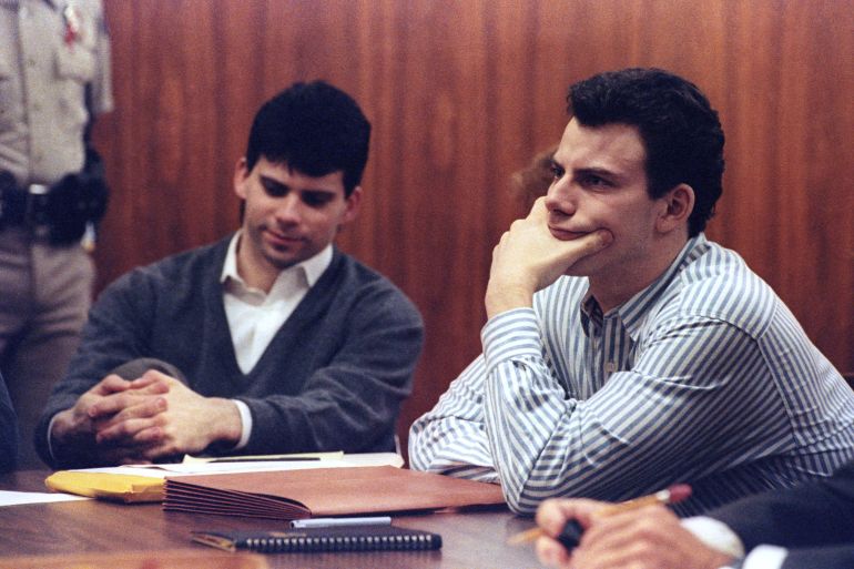 Erik Menendez (R) and brother Lyle listen to court proceedings during a May 17, 1991 appearance in the case of the shotgun murder of their wealthy parents in August 1989. The California Supreme Court must decide whether to review a lower court decision to allow alleged tape confessions made to a psychiatrist as evidence before a preliminary hearing can take place. REUTERS/Lee Celano