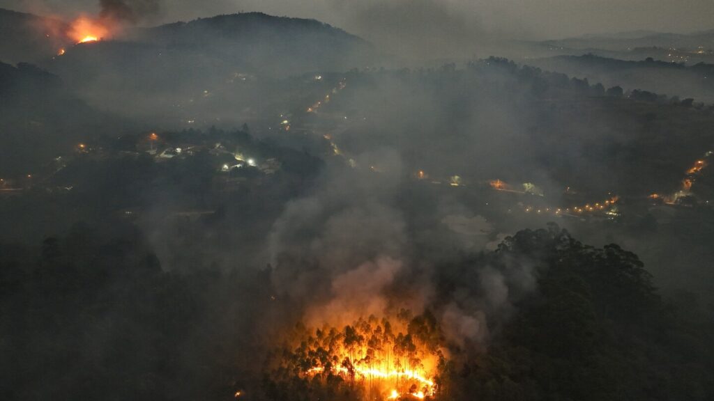 AP PHOTOS: Hallmarks of climate change seen in floods, fires and drought around the globe