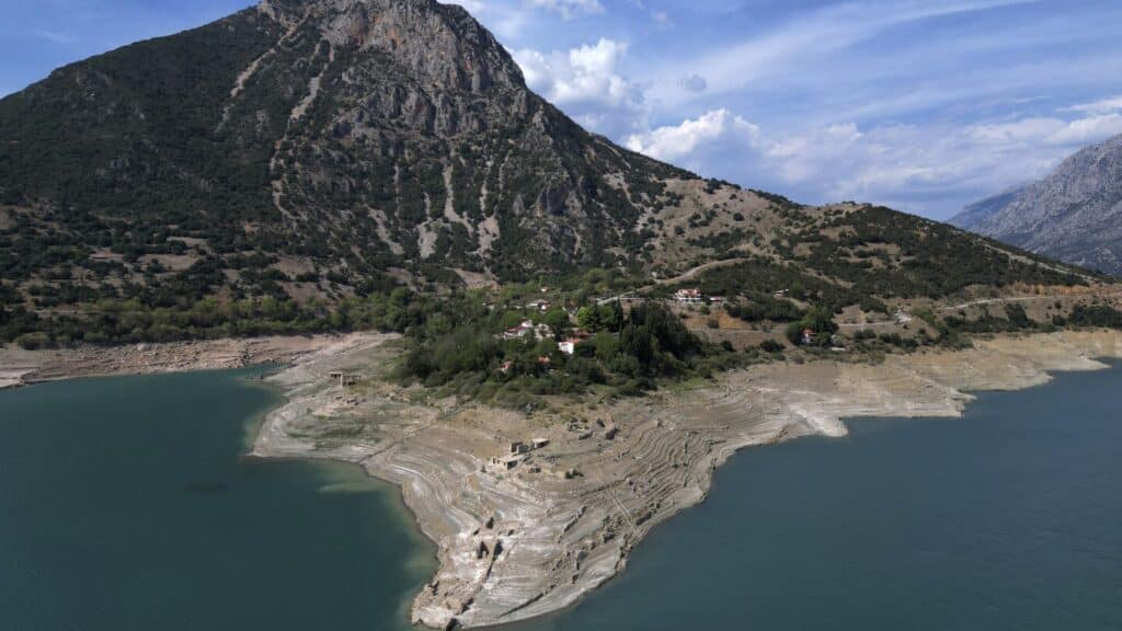 Ruins of a long-sunken Greek village emerge as drought saps a vital reservoir