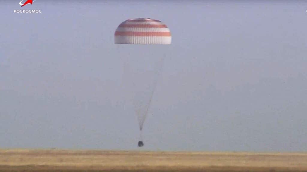 A Soyuz capsule with 2 Russians and 1 American from the International Space Station returns to Earth