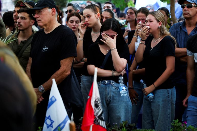 people mourn israeli soldier lieutenant shahar ben nun, who was killed amid the ongoing conflict in gaza between israel and hamas, during his funeral in tel aviv, israel, august 20, 2024. reuters/florion goga tpx images of the day