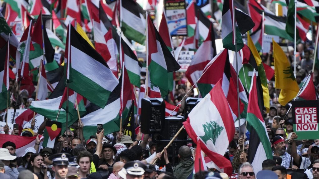 Pro-Palestinian and pro-Israeli crowds rally across the world on the eve of Oct. 7 anniversary