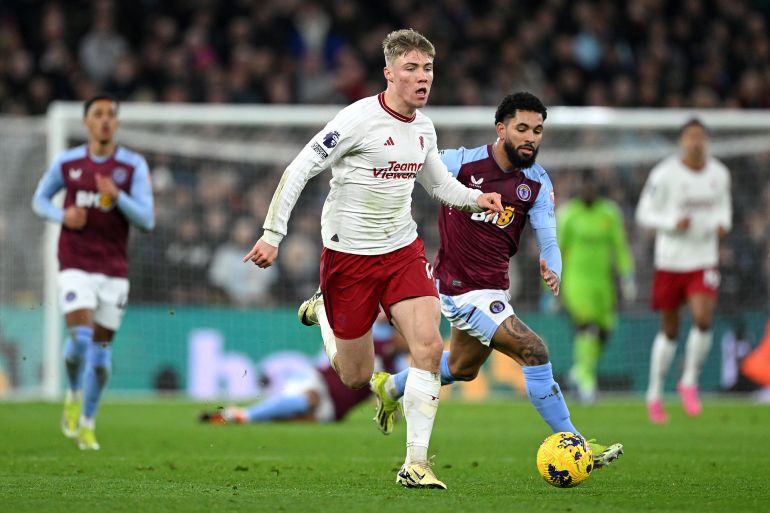 BIRMINGHAM, ENGLAND - FEBRUARY 11: Rasmus Hojlund of Manchester United runs with the ball during the Premier League match between Aston Villa and Manchester United at Villa Park on February 11, 2024 in Birmingham, England. (Photo by Shaun Botterill/Getty Images)