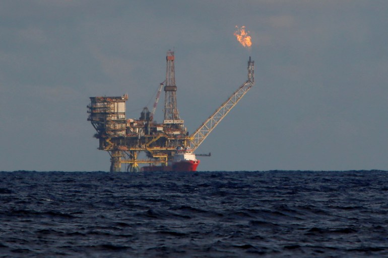 A seagull flies in front of an oil platform in the Bouri Oilfield some 70 nautical miles north of the coast of Libya, October 5, 2017. REUTERS/Darrin Zammit Lupi