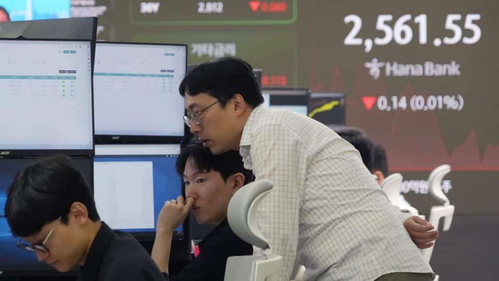 Stock market today: Asian shares are mixed after Middle East tensions weigh on Wall St