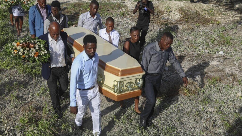 The death toll in a gang attack on a small Haitian town rises to 115, a local official says