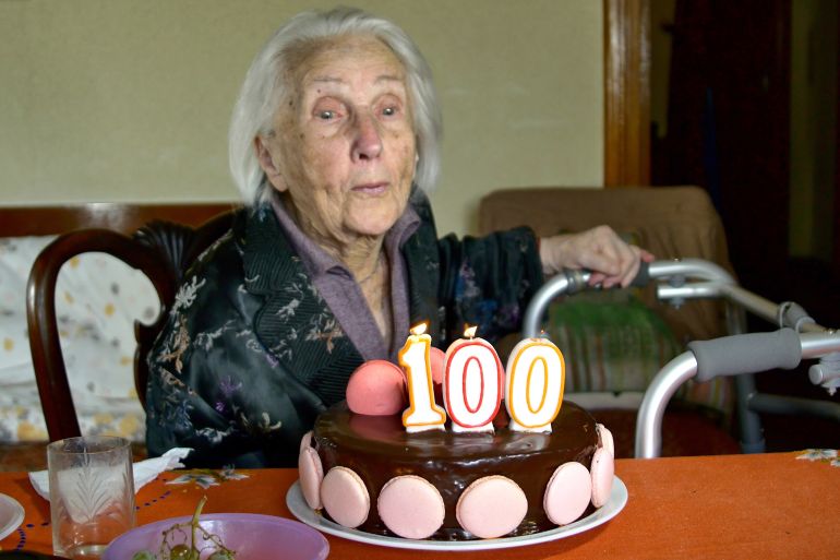 portrait of a hundred years old woman, centenarian, close up; shutterstock id 1022974105; purchase_order: aljazeera ; job: ; client: ; other: