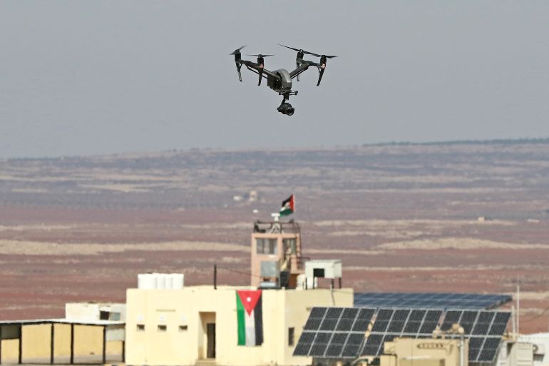 a picture taken during a tour origanized by the jordanian army shows a drone flying over an observation post along the border with syria, on february 17, 2022. - drug trafficking from syria into jordan is becoming "organised" with smugglers stepping up operations and using sophisticated equipment including drones, jordan's army said, warning of a shoot-to-kill policy. since the beginning of this year, jordan's army has killed 30 smugglers and foiled attempts to smuggle into the kingdom from syria 16 million captagon pills -- more than they seized in the whole of 2021 -- the military said. (photo by khalil mazraawi / afp)