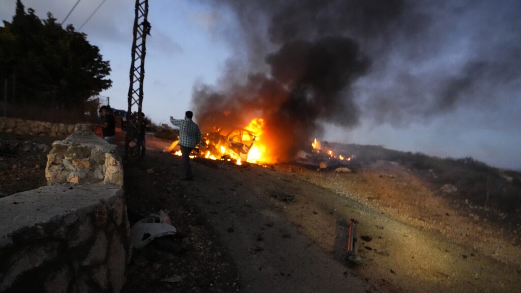 AP Photos: A look back at over a year of fighting as Israel and Hezbollah agree to a truce