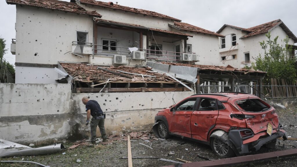 Israeli strike kills Lebanese soldier and wounds 18 as Hezbollah fires rockets at Israel