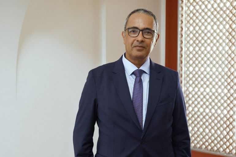 French-Algerian writer Kamel Daoud poses during a visit of France's President at the Santa Cruz forteress in Oran on August 27, 2022. Emmanuel Macron is on a three-day visit to Algeria aimed at mending ties with the former French colony, which this year marks its 60th anniversary of independence. (Photo by Ludovic MARIN / AFP)