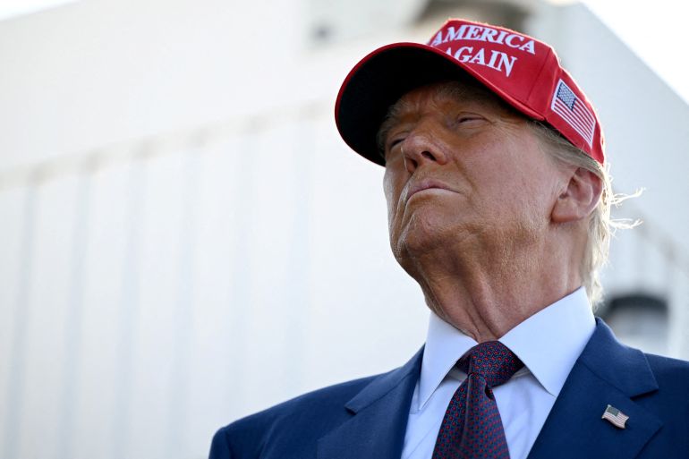 FILE PHOTO: U.S. President-elect Donald Trump attends a viewing of the launch of the sixth test flight of the SpaceX Starship rocket, in Brownsville, Texas, U.S., November 19, 2024 . Brandon Bell/Pool via REUTERS/File Photo