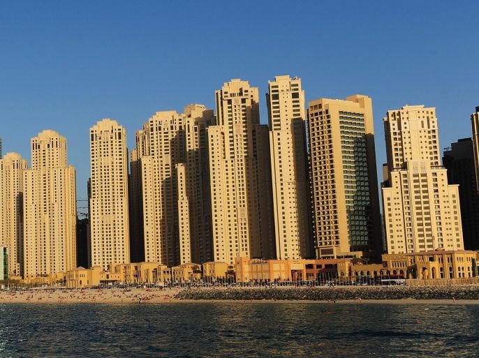 dubai, united arab emirates - november 23: high rise apartments dominate jumeirah beach on november 23, 2009 in dubai, united arab emirates. a six-month delay to repay 36 billion gbp debt has been requested by dubai. according to reports ruler sheikh mohammed bin rashid al-maktoum is currently in neighbouring abu dhabi attempting to negotiate a bail-out.