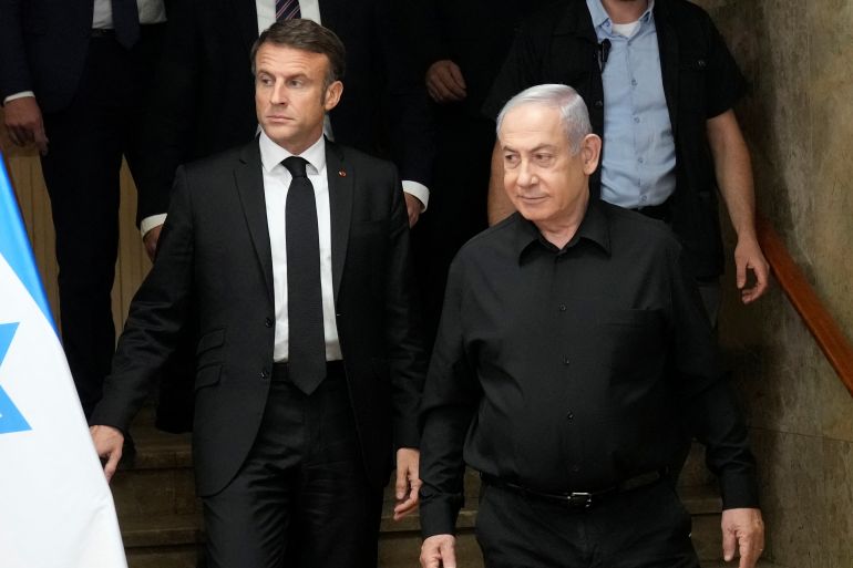 Israeli Prime Minister Benjamin Netanyahu and French President Emmanuel Macron hold a joint press conference, amid the Israeli-Hamas conflict, in Jerusalem, October 24, 2023. Christophe Ena/Pool via REUTERS