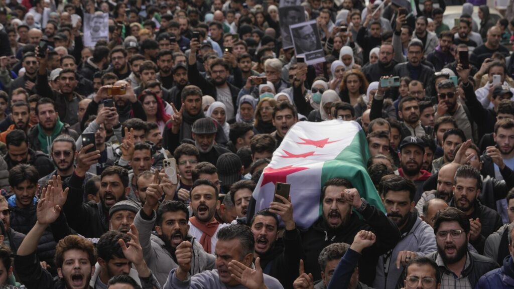 Funeral for activist turns into call for justice for other missing Syrians