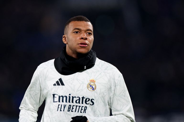 Soccer Football - Champions League - Atalanta v Real Madrid - Gewiss Stadium, Bergamo, Italy - December 10, 2024 Real Madrid's Kylian Mbappe during the warm up before the match REUTERS/Claudia Greco