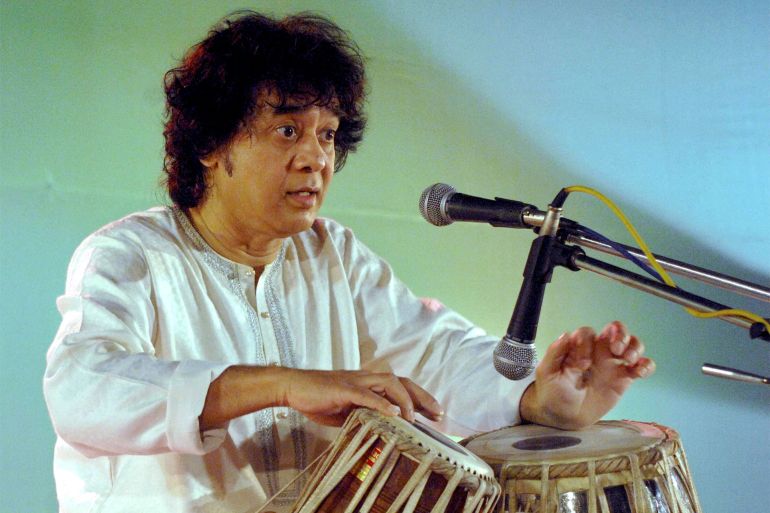 FILE PHOTO: India's tabla maestro Zakir Hussain plays tabla during a cultural programme in the eastern Indian city of Patna December 19, 2008. REUTERS/Krishna Murari Kishan/File Photo