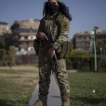 AP PHOTOS: Portraits of former Syrian rebels now soldiers