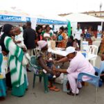 FILE PHOTO: A health employee gives a malaria injection to a child during the official ceremony for the launch of the malaria vaccination campaign for children aged between zero and eleven months in Abobo a district of Abidjan, Ivory Coast July 15, 2024. REUTERS/Luc Gnago/File Photo