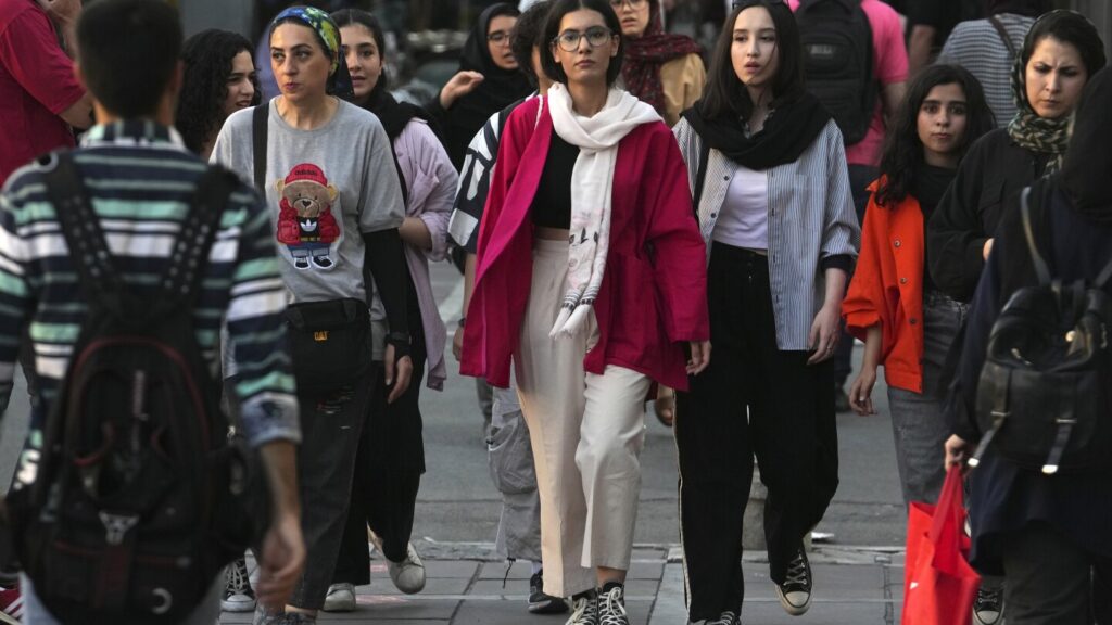 Iran pauses the process to implement a new, stricter headscarf law for women, official says