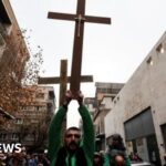 Protests erupt in Syria over Christmas tree burning