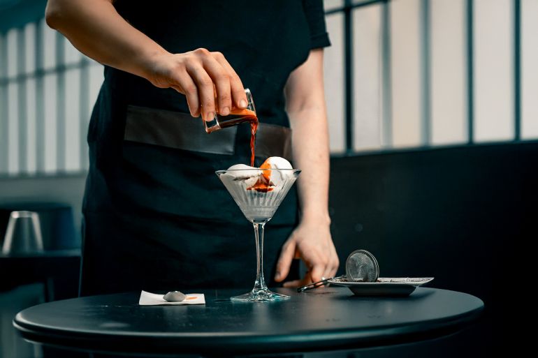 Man Pouring Coffee on Ice Cream