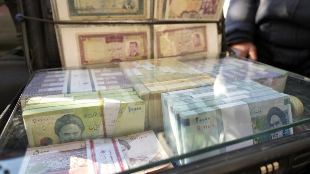 Iran’s rial hits a record low, battered by regional tensions and an energy crisis