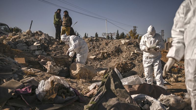 Hundreds of thousands of bodies could be buried in Syrian mass graves, advocacy group says