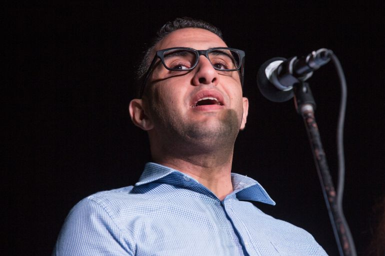 JERUSALEM, ISRAEL - JUNE 1: Palestinian poet Najwan Darwish speaks to visitors to the 2014 Palestine Festival of Literature at the Burj Al-Laqlaq Community Center on June 1, 2014 in Jerusalem, Israel. The festival is an annual event that aims to bring a cultural festival of international standard to audiences in Palestine to assert "the power of culture over the culture of power." (Photo by Rob Stothard/Getty Images)