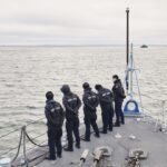 Estonia steps up patrols in the icy Baltic Sea in a show of force after suspected cable sabotage