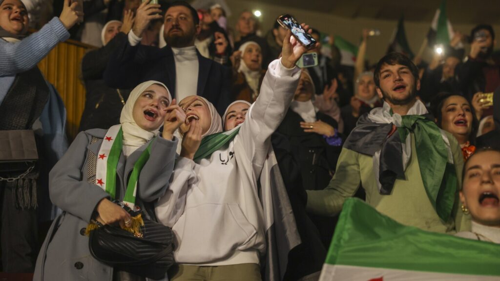 Syrians celebrate a month since Assad’s overthrow with revolutionary songs in Damascus