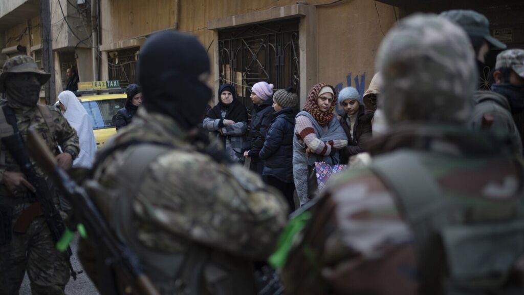 AP PHOTOS: Syria’s new security forces conduct sweeps in Homs, looking for ousted Assad’s loyalists