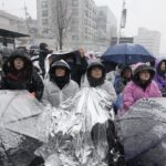 South Korean protesters brave cold to demand Yoon’s ouster as detention deadline looms